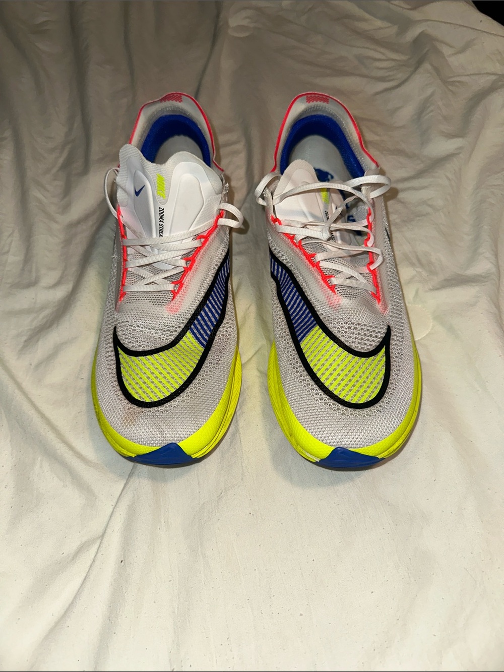 Nike White/Volt/Blue Running Sneakers with Coral Accents